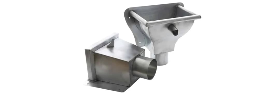 Kosze spustowe do rynien: funkcje, rodzaje i wybór idealnego